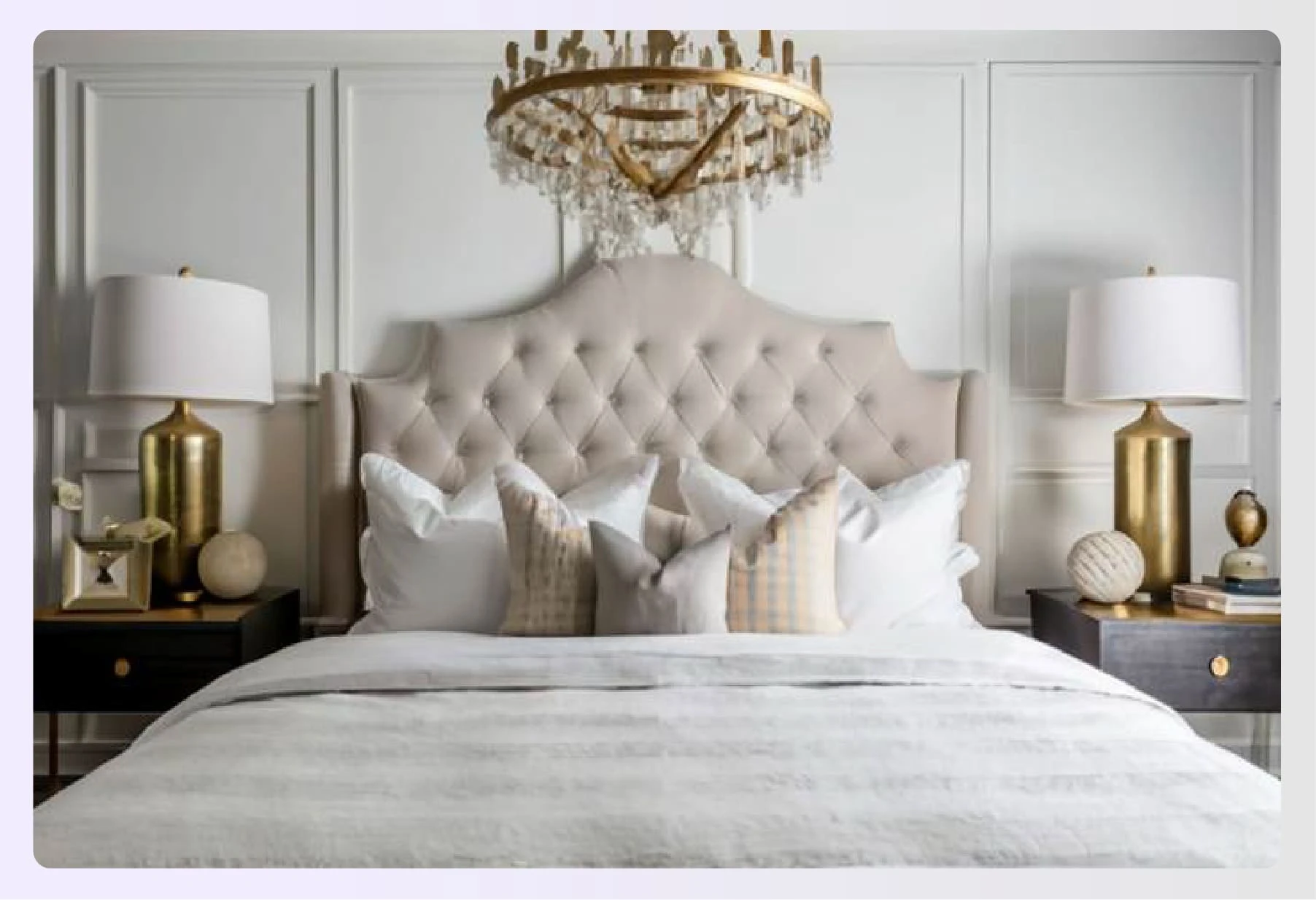 Elegant eggshell white headboard with gold lamps