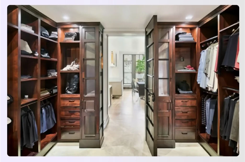  Floor-to-ceiling closet with hidden door mechanism