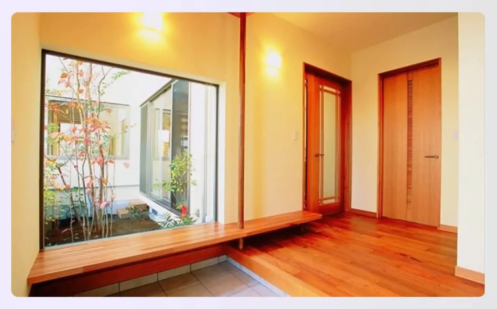 Hallway with a large window view to a garden