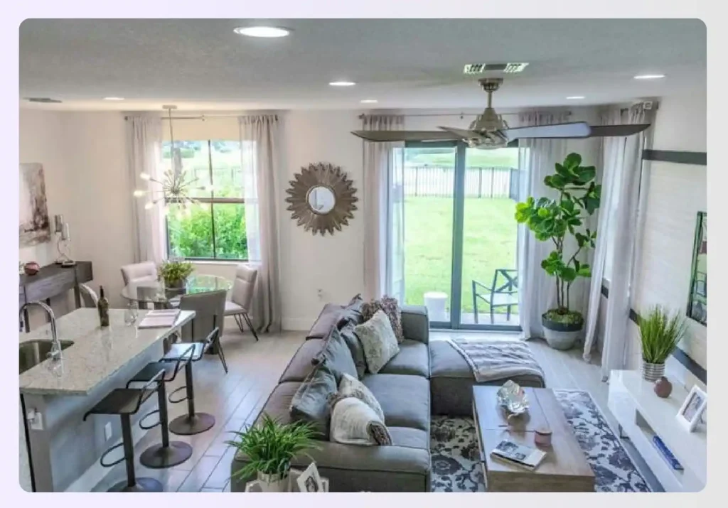 Large grey sectional sofa defining a living room