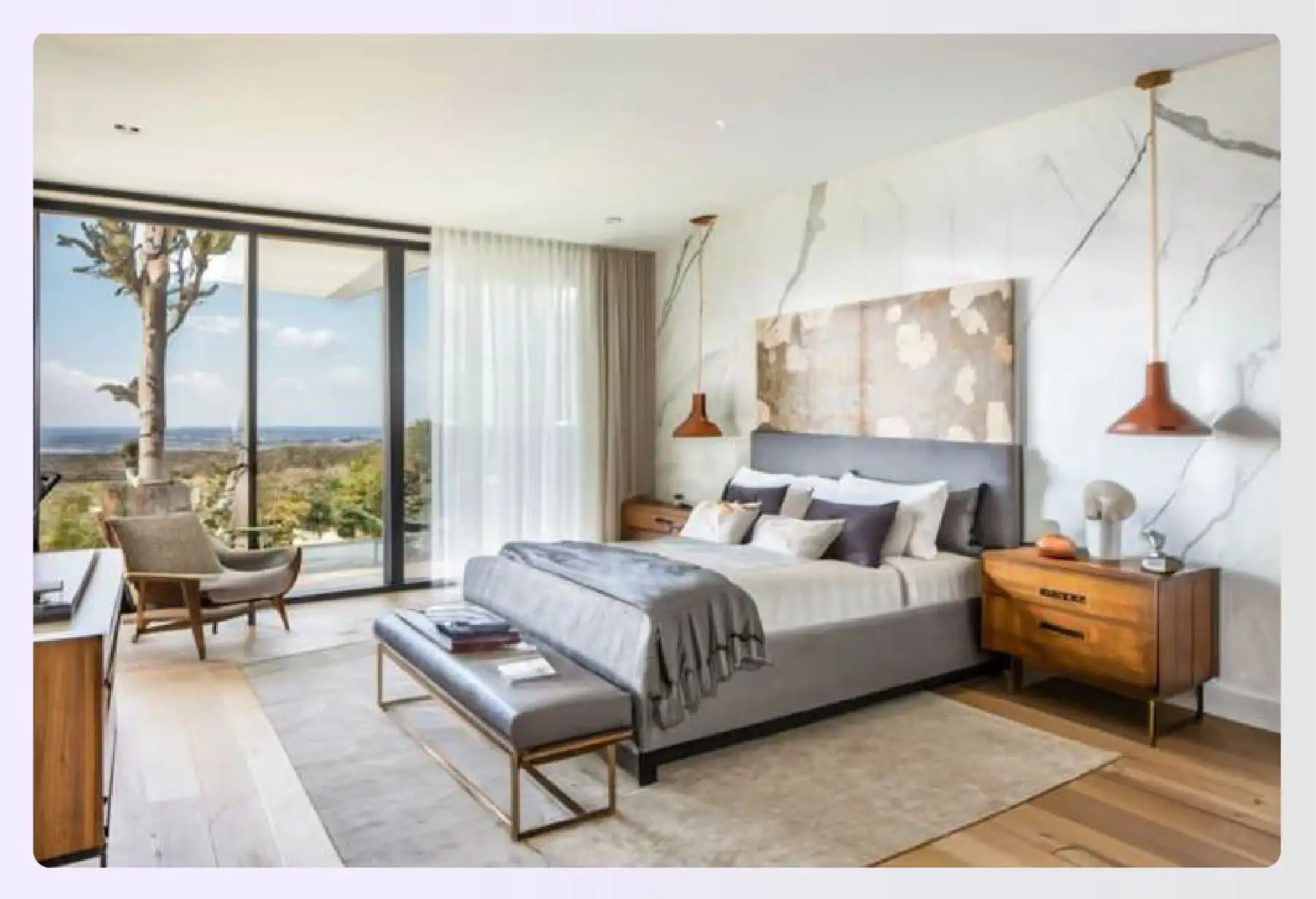 Marble, gray and wooden hues in a bedroom