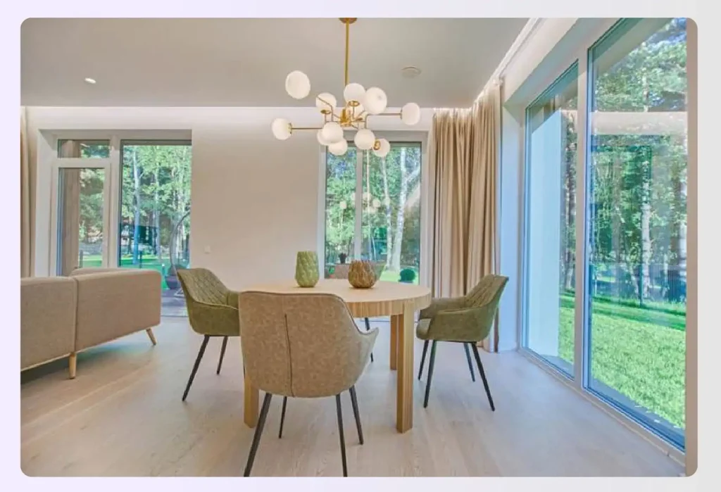 Open dining room with large glass windows