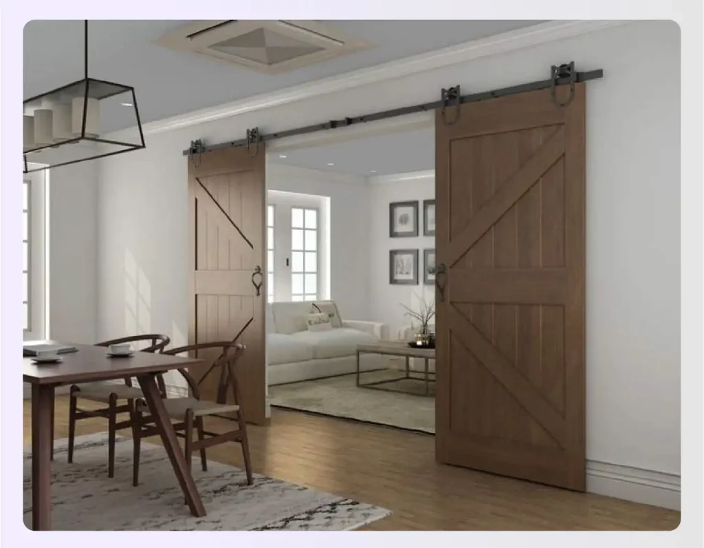 Rustic sliding barn door separating two open spaces