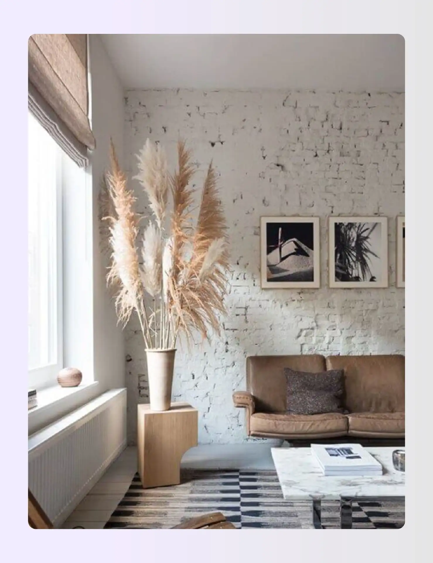 Artistic corner with dried pampas grass and art Artistic corner with dried pampas grass and art