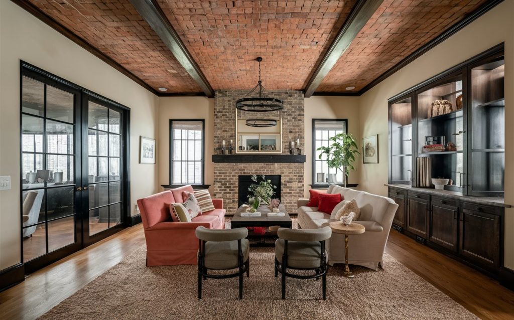Interior view of a room with a textured brick ceiling.