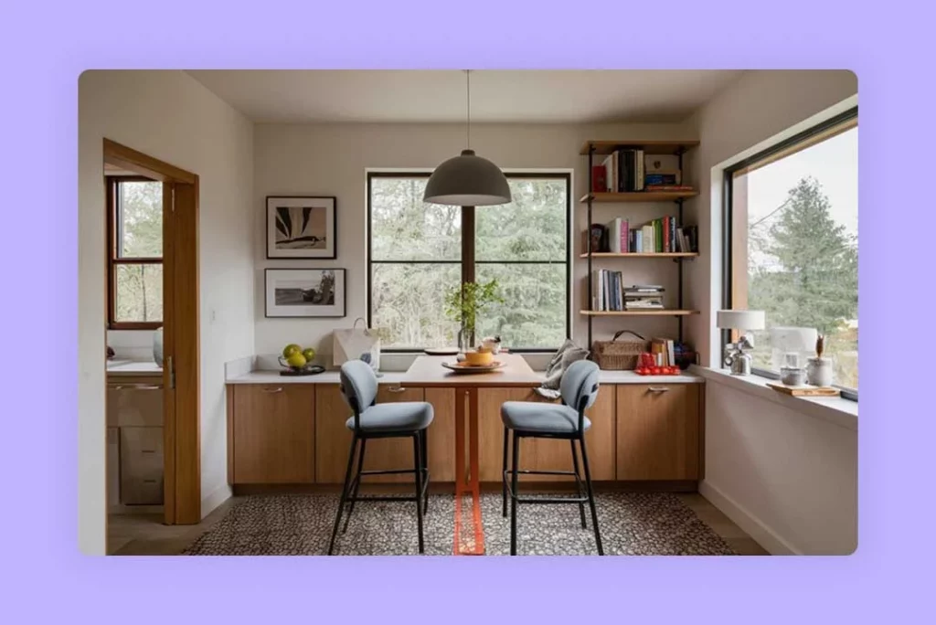 A modern kitchen dining area with a white table and four chairs.