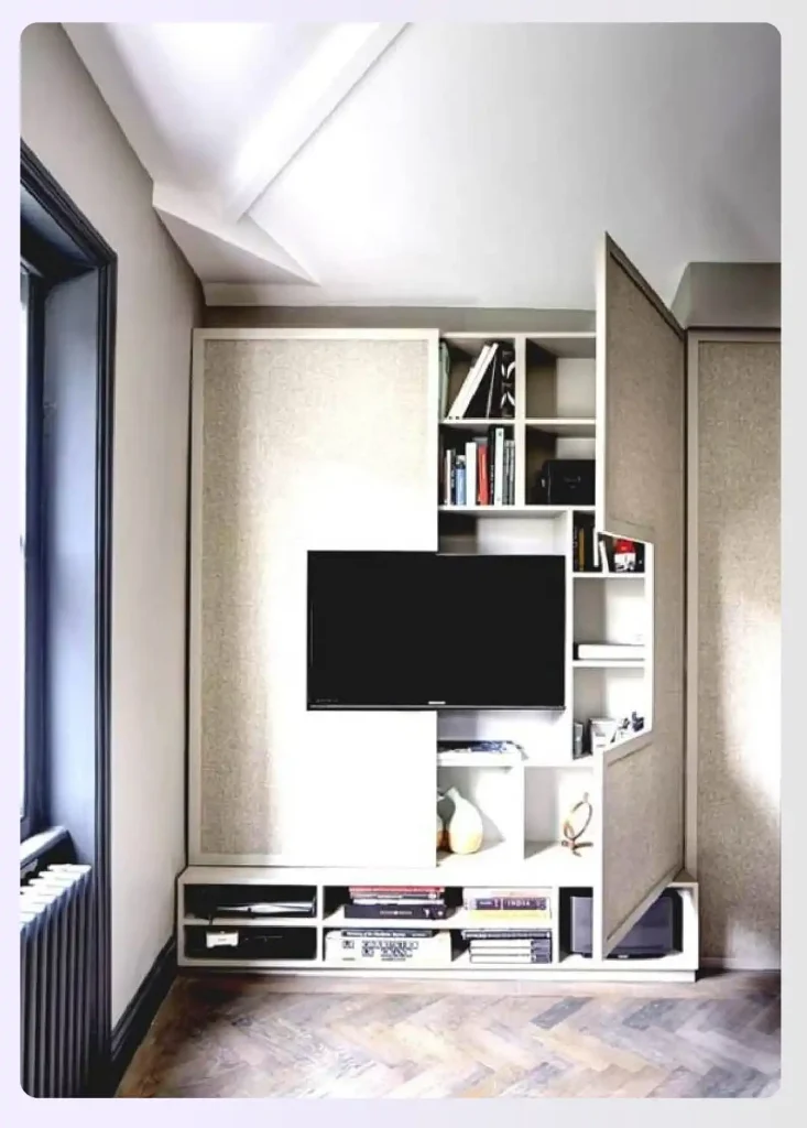 A vertical shelving unit around a television