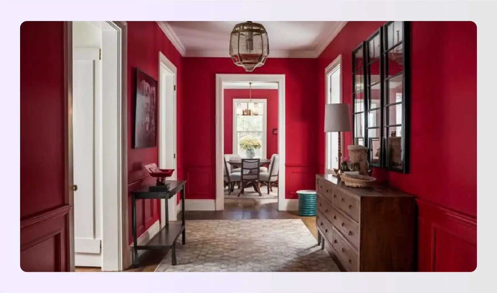 Bold red hallway walls with gallery frames Bold red hallway walls with gallery frames