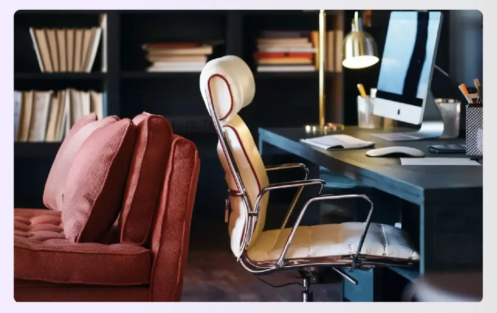 A comfortable red sofa next to a home office desk. A comfortable red sofa next to a home office desk.