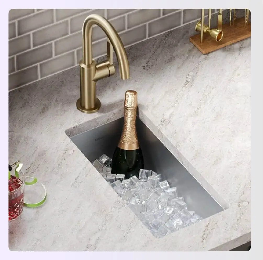 A small dedicated bar sink with a faucet A small dedicated bar sink with a faucet