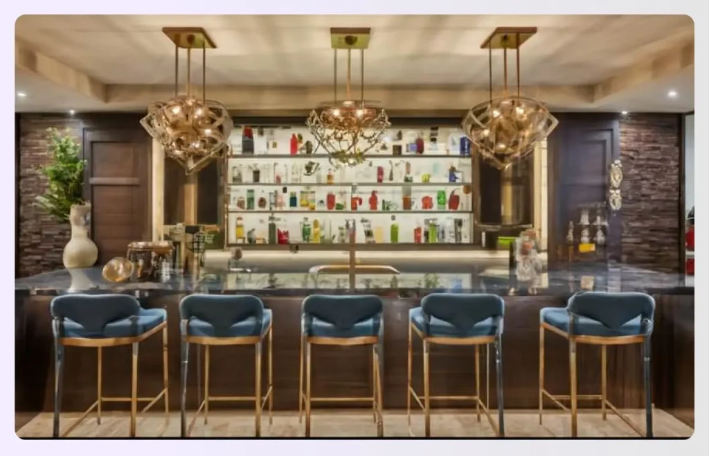 Sculptural pendant lights over a modern home bar Sculptural pendant lights over a modern home bar