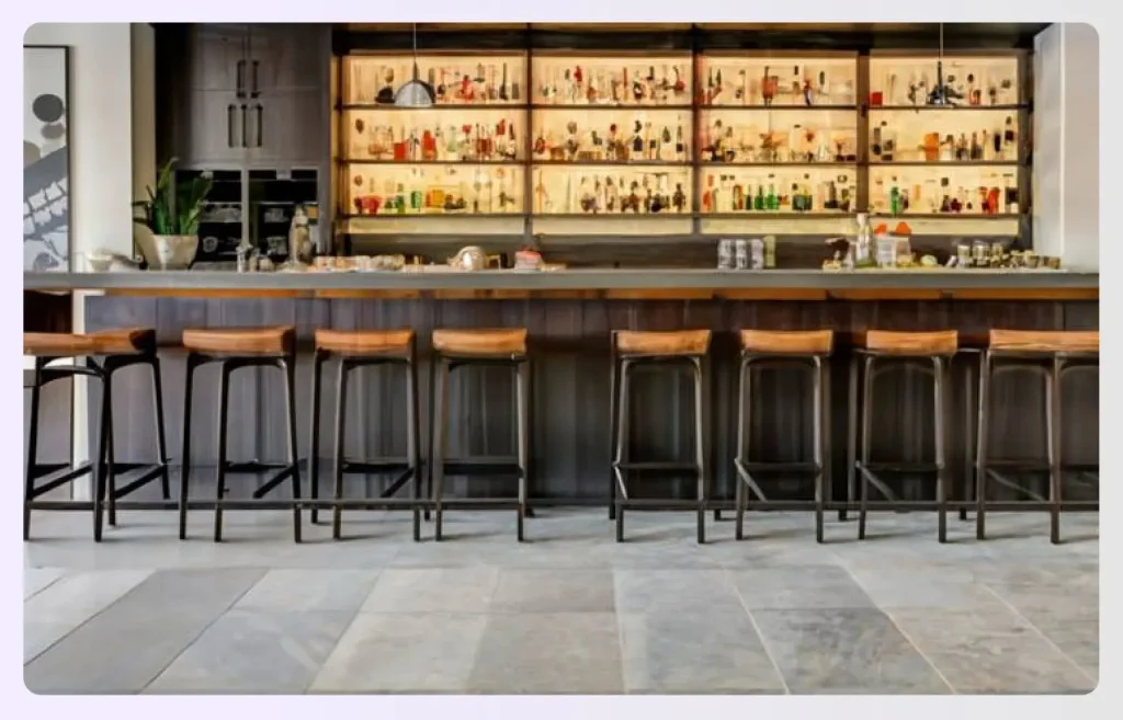 Water-resistant tile flooring in a home bar Water-resistant tile flooring in a home bar