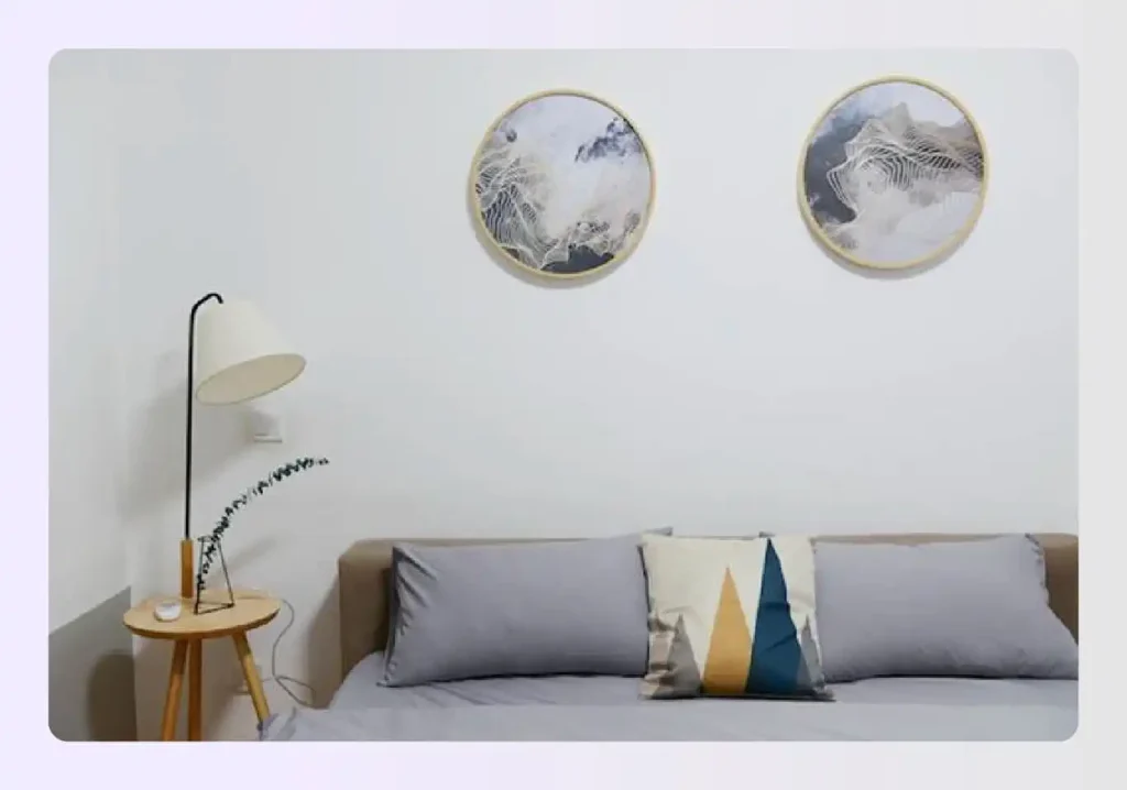 Grey bed sheets with decorative pillows Grey bed sheets with decorative pillows